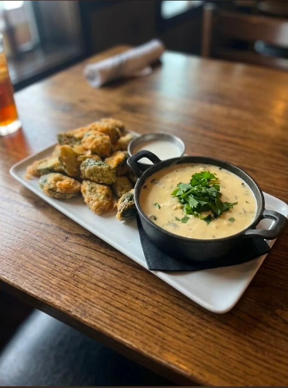 Crispy fried bites served with a creamy dipping sauce