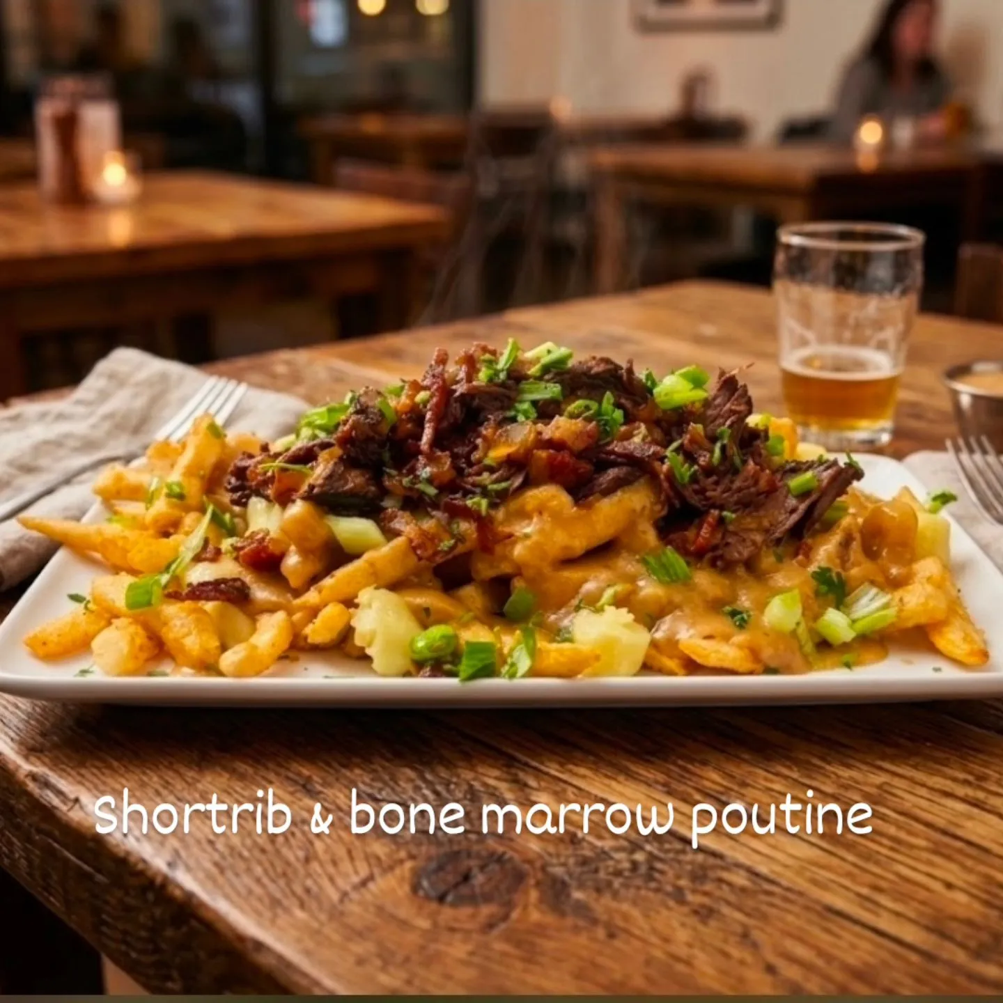 The Local’s short rib and bone marrow poutine, made with crisp fries and topped with tender short rib